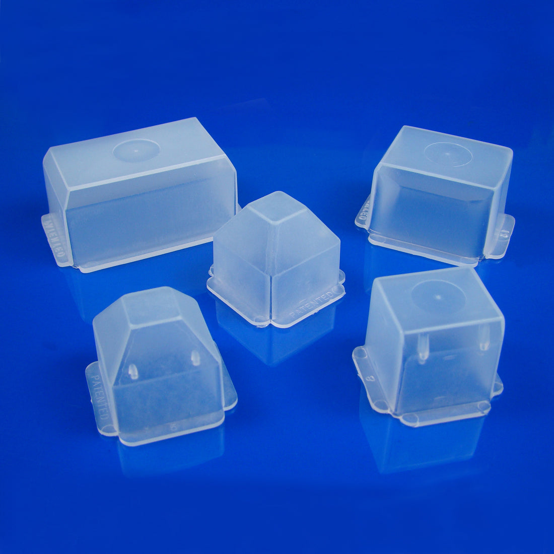 Polysciences Peel-A-Way® Molds Sampler Pack showing five translucent disposable embedding molds of various shapes and sizes used for tissue embedding in histology applications.
